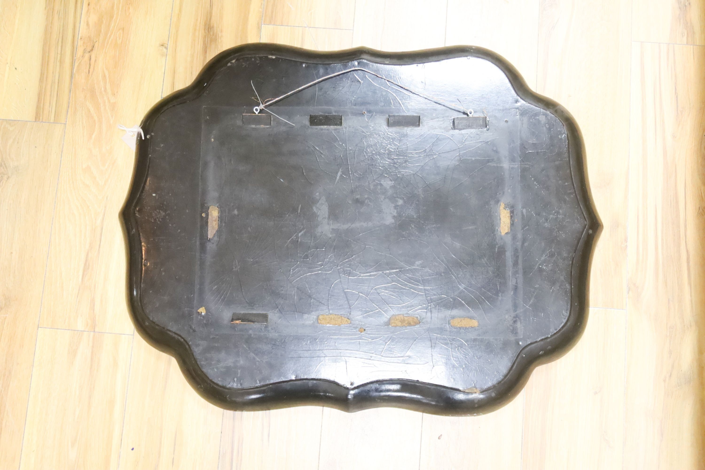 A late Regency black-lacquered papier mache tray, 80cm